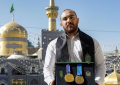 اهدا نشان های طلای قهرمان کشتی جهان به آستان قدس رضوی
